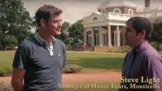 A man being interviewed in front of a historical building