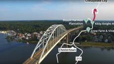 A large metal bridge crossing over a river